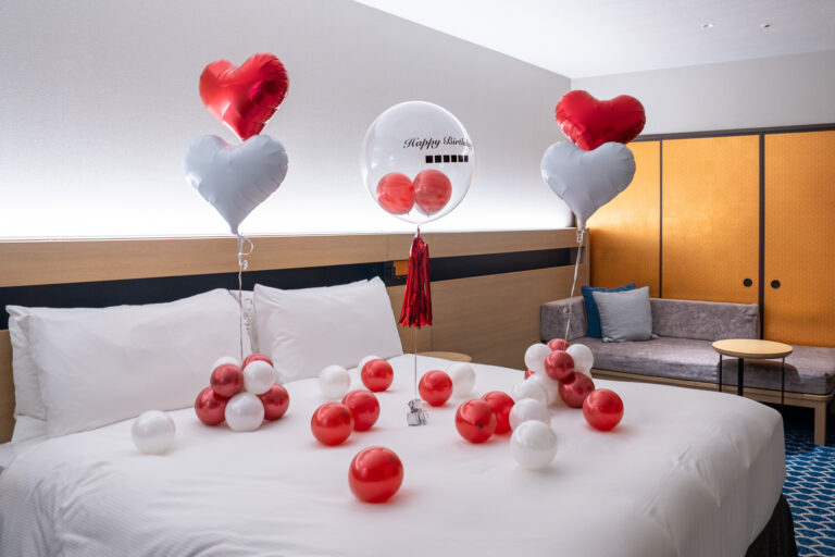Surprise room decoration with red and white heart balloons at Hilton Tokyo Bay