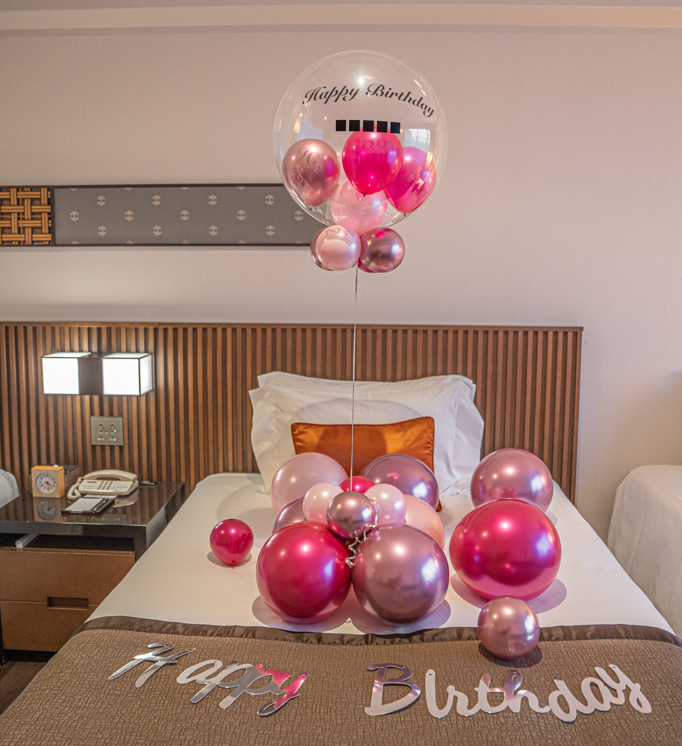 Pink balloon birthday surprise decoration at ザ・プリンス さくらタワー東京