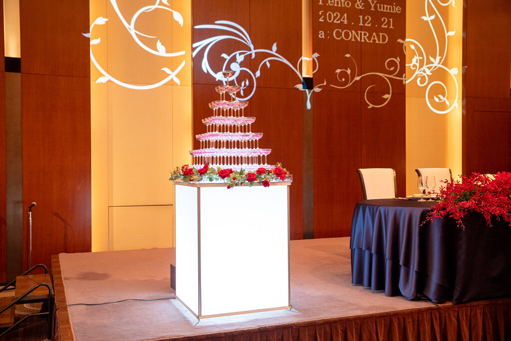 Champagne Tower Show and Red Rose Decorations for a Wedding Reception at コンラッド東京