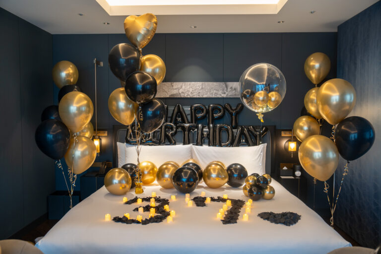 Gold & Black themed birthday surprise balloon decoration at ベルスター東京