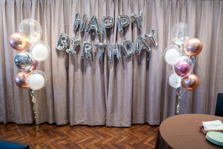 Birthday surprise decorations at MODIS銀座店, silver metallic balloon decoration