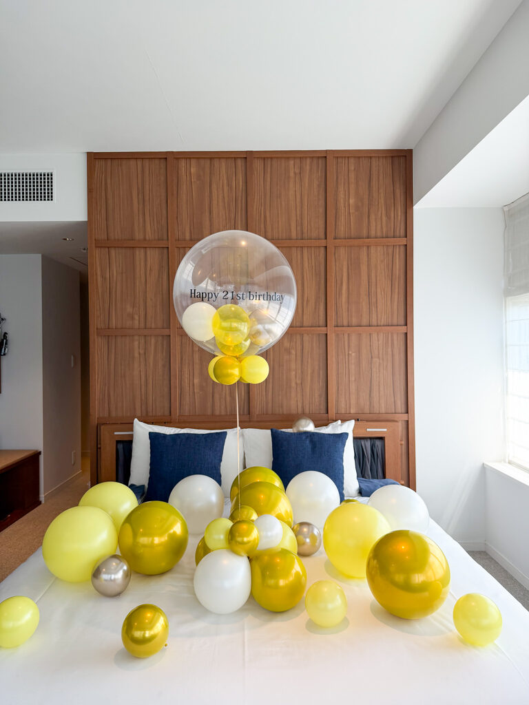 Birthday Surprise Decoration at HAMACHO HOTEL - Elegant Yellow & Silver Decoration
