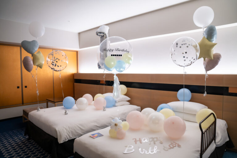 Pastel color birthday surprise decorations at ヒルトン東京ベイ